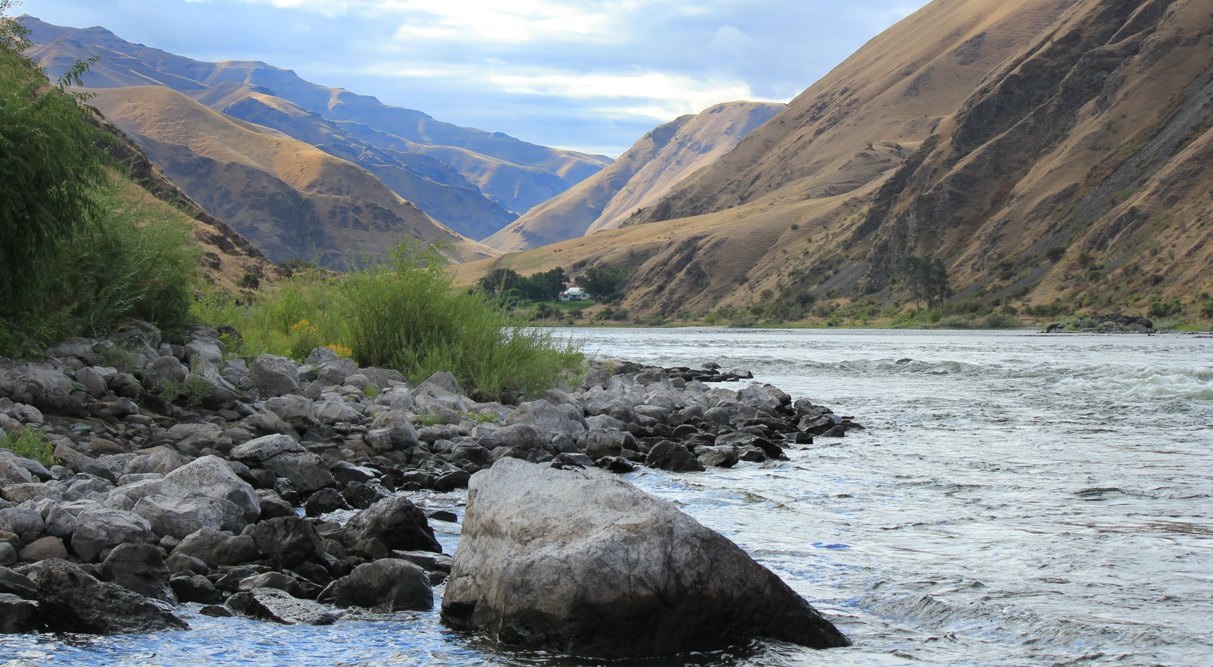 A river winds through a rocky canyon.